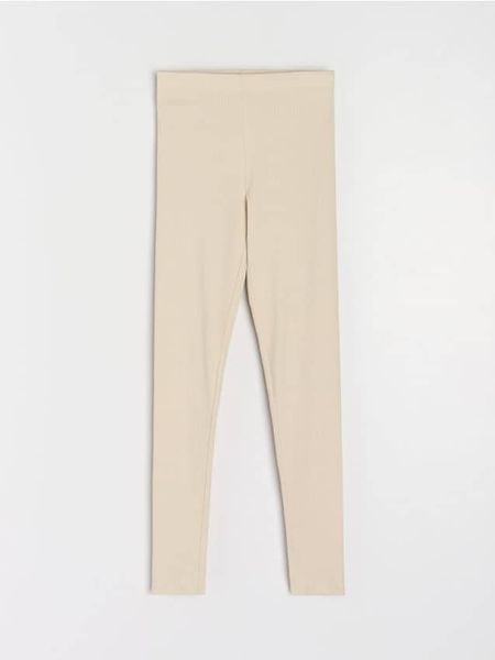 Prążkowane legginsy z gumką w pasie - kremowy. Białe legginsy damskie Sinsay, l, bez wzorów, prążkowane. Za 29.99 zł.