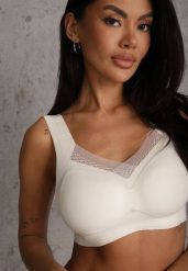 Biały Sportowy Biustonosz z Usztywnieniem Ozdobiony Siateczkową Wstawką Edalissa. Białe biustonosze sportowe damskie Renee, bez wzorów. Za 24.99 zł.