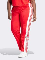 Adidas Spodnie sportowe w kolorze czerwonym rozmiar: 3X. Czerwone spodnie dresowe damskie Adidas, bez wzorów, outdoorowe. Za 202.03 zł.