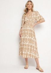 Ciemnobeżowa Sukienka Wiskozowa Rozkloszowana z Odkrytymi Plecami w Print Boho Turaisa. Brązowe sukienki damskie Born2be, bez wzorów, z wiskozy, boho, bez ramiączek. Za 89.99 zł.