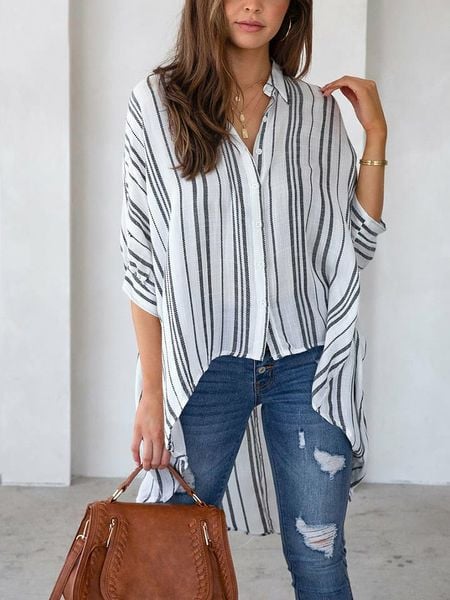 LA Angels Bluzka w kolorze białym rozmiar: XL. Białe bluzki damskie LA Angels, xl, bez wzorów, bez kołnierzyka, bez ramiączek. Za 101.23 zł.