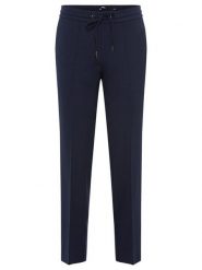 Olsen Spodnie w kolorze granatowym rozmiar: 34. Niebieskie spodnie materiałowe damskie Olsen, bez wzorów, z materiału. Za 113.36 zł.