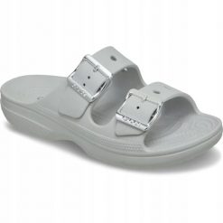 Klapki Dla Dorosłych Crocs Saturday Metallic Buckle. Brązowe klapki damskie Crocs, bez wzorów, z materiału, bez obcasa, bez zapięcia. Za 199.99 zł.