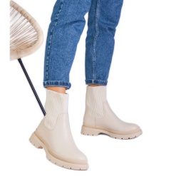 Beżowe botki z materiałową cholewką beżowy. Brązowe botki damskie z materiału, eleganckie, z okrągłym noskiem, bez obcasa, na płaskiej podeszwie, bez zapięcia. Za 82.56 zł.