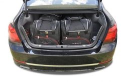 Torby Do Bagażnika Bmw 7L 2008-2015 4Szt Kjust. Czarne torby podróżne KJUST, bez wzorów, z kauczuku. Za 1,249.00 zł.