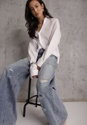 Niebieskie Szerokie Jeansy Palazzo z Bawełny z Dziurami i Przetarciami Erilenna. Niebieskie jeansy damskie Renee, z podwyższonym stanem. Za 149.99 zł.