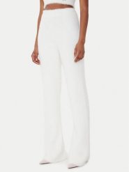 Guess Spodnie dzianinowe O5BB03 Z1282 Écru Flare Fit. Spodnie materiałowe damskie Guess, z aplikacjami, z dzianiny. Za 299.99 zł.