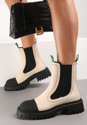 Beżowe Botki Victtorie. Brązowe botki damskie Renee, z materiału, przed kolano, bez obcasa, na płaskiej podeszwie, bez zapięcia. Za 169.99 zł.