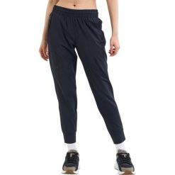Spodnie sportowe damskie Under Armour Unstoppable Jogger. Czarne spodnie sportowe damskie Under Armour, l, bez wzorów, z dresówki, na fitness i siłownię. Za 538.00 zł.