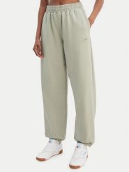 Reebok Spodnie dresowe Reebok x Ewa Chodakowska Ada RK25621CCW Zielony Relaxed Fit. Zielone spodnie dresowe damskie Reebok, s, bez wzorów, z dresówki. Za 249.99 zł.