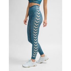 Damskie legginsy bezszwowe Hummel MT Drops. Niebieskie legginsy damskie Hummel, bez wzorów, z dzianiny. W wyprzedaży za 147.80 zł.