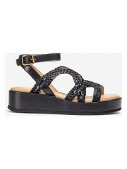 Unisa Skórzane sandały w kolorze czarnym na koturnie rozmiar: 41. Czarne sandały damskie Unisa, bez wzorów, z otwartym noskiem, bez obcasa, na koturnie, bez zapięcia. Za 304.99 zł.