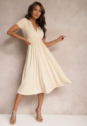 Beżowa Sukienka Taliowana z Kopertowym Dekoltem o Rozkloszowanym Kroju Rimadea. Brązowe sukienki damskie Renee, bez wzorów, eleganckie, bez ramiączek. W wyprzedaży za 135.99 zł.