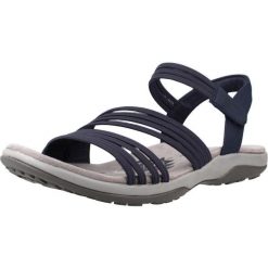 Sandały SKECHERS 163573S Niebieski. Niebieskie sandały damskie Skechers, bez wzorów, z syntetyku, bez obcasa, bez zapięcia. Za 242.99 zł.