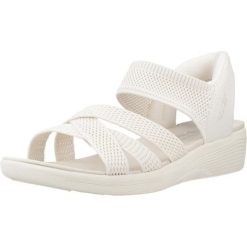 Sandały SKECHERS SLIP-INS ARYA Biały. Białe sandały damskie Skechers, bez wzorów, z materiału, bez obcasa, bez zapięcia. Za 278.99 zł.