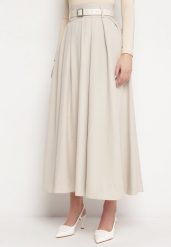 Jasnobeżowa Spódnica o Rozkloszowanym Plisowanym Fasonie z Paskiem z Klamrą Aferna. Brązowe spódnice damskie Born2be, m, bez wzorów, eleganckie, maxi. Za 169.99 zł.