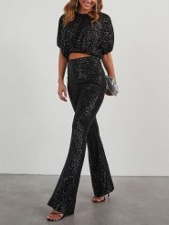 Milan Kiss Spodnie w kolorze czarnym rozmiar: L. Czarne spodnie materiałowe damskie Milan Kiss, bez wzorów, z materiału. Za 152.99 zł.