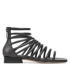 Sandały GINO ROSSI. Czarne sandały damskie Gino Rossi, bez wzorów, bez obcasa, na płaskiej podeszwie, bez zapięcia. Za 299.99 zł.