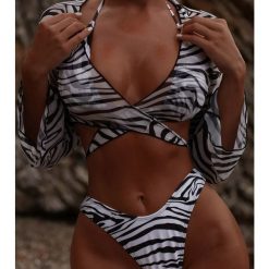 Strój kąpielowy z crop topem i długim rękawem na lato Shemeka. Brązowe stroje jednoczęściowe Intica, bez wzorów. Za 149.00 zł.