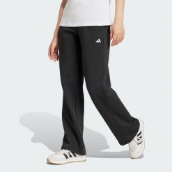 Spodnie Essentials Small Logo Feel Cozy Open-Hem. Czarne spodnie dresowe damskie Adidas, bez wzorów, z polaru. Za 157.99 zł.
