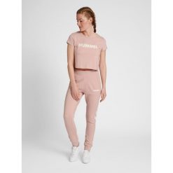 Damska koszulka crop top Hummel Legacy. Białe koszulki damskie Hummel, m, bez wzorów, bez kołnierzyka, bez ramiączek. Za 94.00 zł.