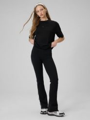 4F Legginsy z rozszerzanymi nogawkami damskie - czarne M. Czarne legginsy damskie 4F, m, bez wzorów, z bawełny. Za 129.99 zł.