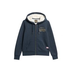 Kurtka z kapturem z zamkiem i metalowym logo dla kobiet Superdry Luxe. Niebieskie koszulki sportowe damskie Superdry, bez wzorów, bez ramiączek. W wyprzedaży za 363.80 zł.