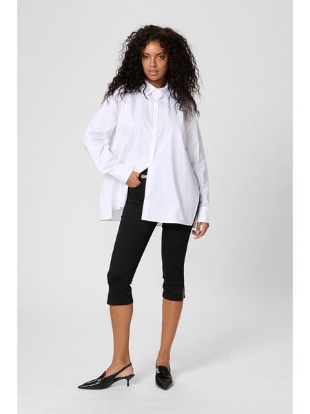 Kaffe Koszula w kolorze białym rozmiar: 34. Białe koszule damskie Kaffe, z aplikacjami, z bawełny, bez kołnierzyka, bez ramiączek. Za 135.49 zł.