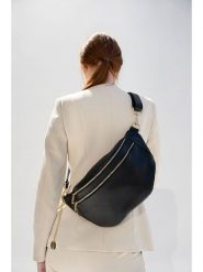 Christian Laurier Skórzana saszetka "Dayana" w kolorze czarnym - 19 x 33 cm rozmiar: onesize. Czarne nerki i saszetki damskie Christian Laurier, bez wzorów, z materiału. Za 321.97 zł.