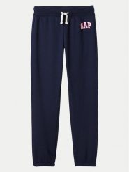 Gap Spodnie dresowe 482442-04 Granatowy Regular Fit. Niebieskie spodnie dresowe dziewczęce GAP, bez wzorów, z bawełny. Za 79.99 zł.