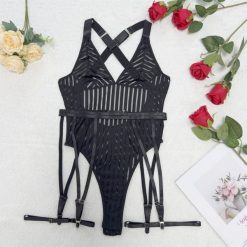 Body z dużym dekoltem na wieczorne wyjścia Arbana. Czarne body i gorsety Intica, bez wzorów, z tkaniny. Za 119.00 zł.