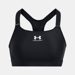 Stanik sportowy do jogi i pilatesu damski Under Armour. Czarne biustonosze sportowe damskie Under Armour, bez wzorów. Za 219.99 zł.