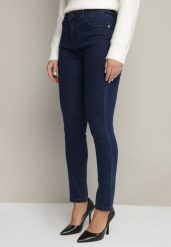 Granatowe Jeansy o Fasonie Slim z Regularnym Stanem Zelzedis. Niebieskie jeansy damskie Born2be, bez wzorów, z bawełny. Za 24.99 zł.