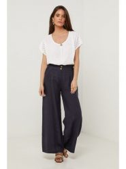 Lin Passion Lniane spodnie w kolorze granatowym rozmiar: 38/40. Niebieskie spodnie materiałowe damskie Lin Passion, bez wzorów, ze lnu. Za 130.99 zł.