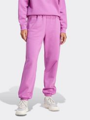 Adidas Spodnie dresowe w kolorze fioletowym rozmiar: L. Różowe spodnie dresowe damskie Adidas, l, bez wzorów, z dresówki. Za 153.71 zł.