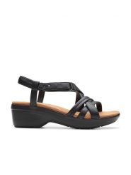 Clarks Skórzane sandały "Tuleah May" w kolorze czarnym na obcasie rozmiar: 39. Czarne sandały damskie Clarks, bez wzorów, z otwartym noskiem, bez obcasa, na koturnie, bez zapięcia. Za 158.47 zł.