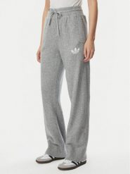 Adidas Spodnie dresowe Essentials IA4439 Szary jasny Loose Fit. Szare spodnie dresowe damskie Adidas, l, bez wzorów, z bawełny. Za 299.99 zł.