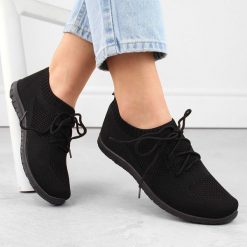 Buty sportowe damskie siateczkowe wsuwane czarne News 1020. Czarne obuwie sportowe casual damskie NEWS, z materiału, bez zapięcia. Za 49.50 zł.