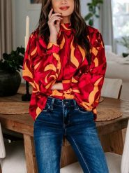 LA Angels Bluzka w kolorze czerwono-żółtym rozmiar: L. Czerwone bluzki damskie LA Angels, l, bez wzorów, bez kołnierzyka, bez ramiączek. Za 118.01 zł.