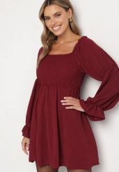 Bordowa Rozkloszowana Sukienka z Elastyczną Górą i Falbankami przy Rękawach Saviella. Czerwone sukienki damskie Born2be, bez wzorów, z jeansu, eleganckie, bez ramiączek. Za 79.99 zł.