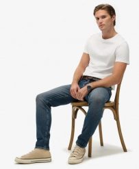 Superdry Jeansy Slim Vintage z Bawełny Organicznej – Storm Blue. Niebieskie jeansy damskie Superdry. Za 478.55 zł.