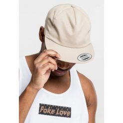 Czapka Flexfit untructured 5-panel. Zielone czapki z daszkiem damskie FLEXFIT, bez wzorów. Za 68.15 zł.