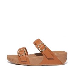 Kobiece klapki na koturnie FitFlop Lulu. Brązowe klapki damskie FIT FLOP, bez wzorów, bez obcasa, na koturnie, bez zapięcia. Za 565.50 zł.