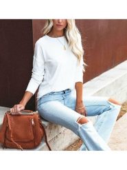 Milan Kiss Koszulka w kolorze białym rozmiar: L. Białe bluzki damskie Milan Kiss, l, bez wzorów, bez kołnierzyka, bez ramiączek. Za 113.99 zł.