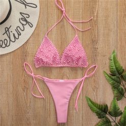 Bikini wiązane regulowane na plażę i basen Gorana. Czarne bikini Intica, bez wzorów. Za 169.00 zł.