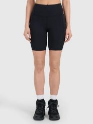 4F Legginsy sportowe w kolorze czarnym rozmiar: L. Czarne legginsy damskie 4F, l, bez wzorów, z materiału, z podwyższonym stanem, outdoorowe. Za 92.21 zł.