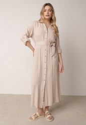 Beżowa Bawełniana Sukienka Koszulowa z Paskiem i Regulowanymi Rękawami Sadevia. Brązowe sukienki damskie Born2be, bez wzorów, z bawełny, biznesowe, bez ramiączek. Za 119.99 zł.