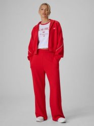 4F Spodnie dresowe z szerokimi nogawkami damskie - czerwone XL. Czerwone spodnie dresowe damskie 4F, l, bez wzorów, z dresówki. Za 159.99 zł.