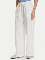 Tommy Jeans Spodnie materiałowe DW0DW22285 Biały Loose Fit. Białe spodnie materiałowe damskie Tommy Jeans, bez wzorów, z jeansu. Za 409.99 zł.