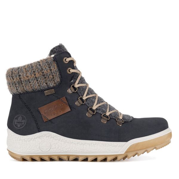 Trzewiki Rieker. Niebieskie botki damskie Rieker, bez obcasa, na płaskiej podeszwie, bez zapięcia. Za 279.99 zł.